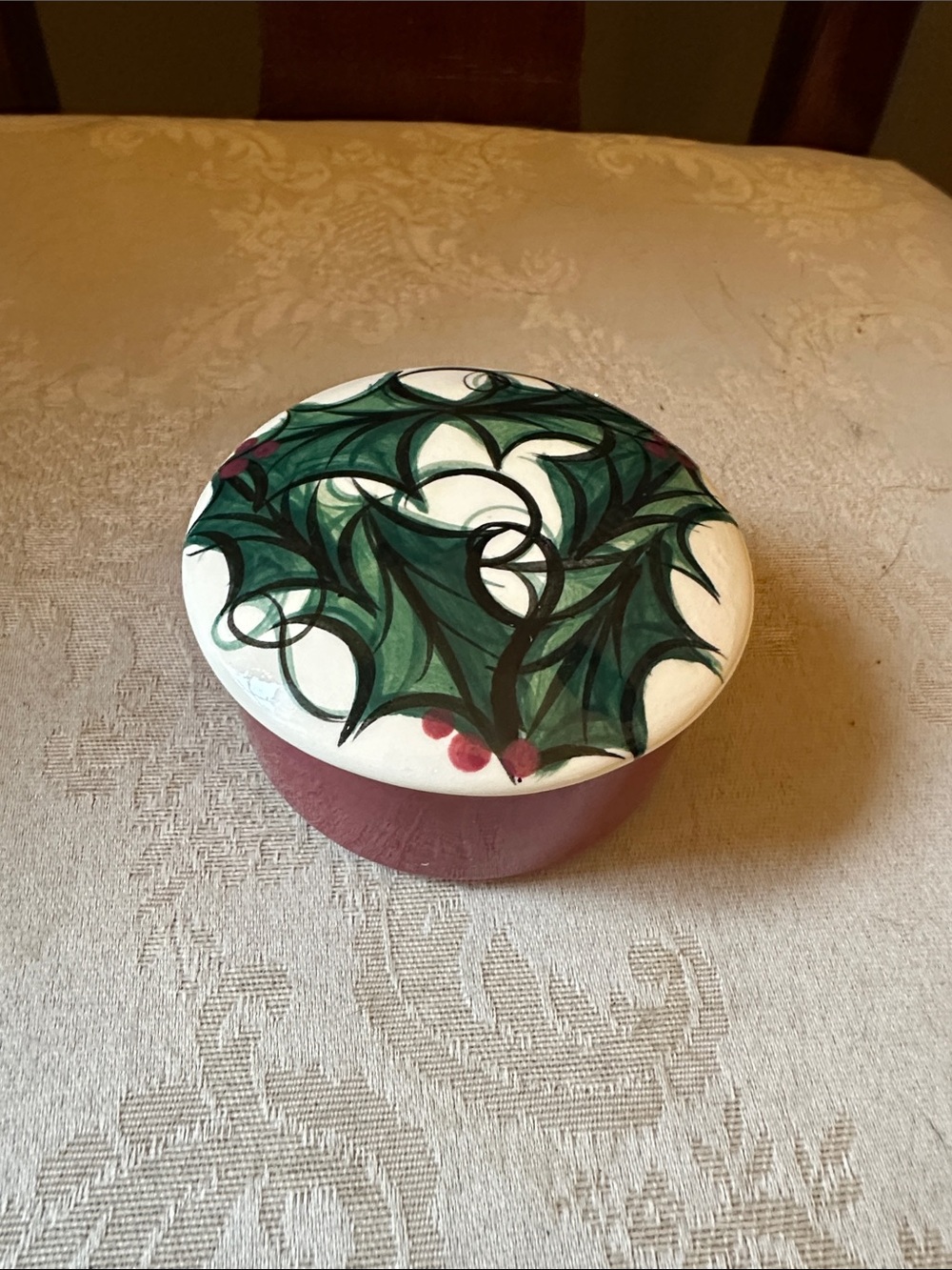 Signed Lacey Griffin ceramic trinket dish with Holly wreath painted on lid